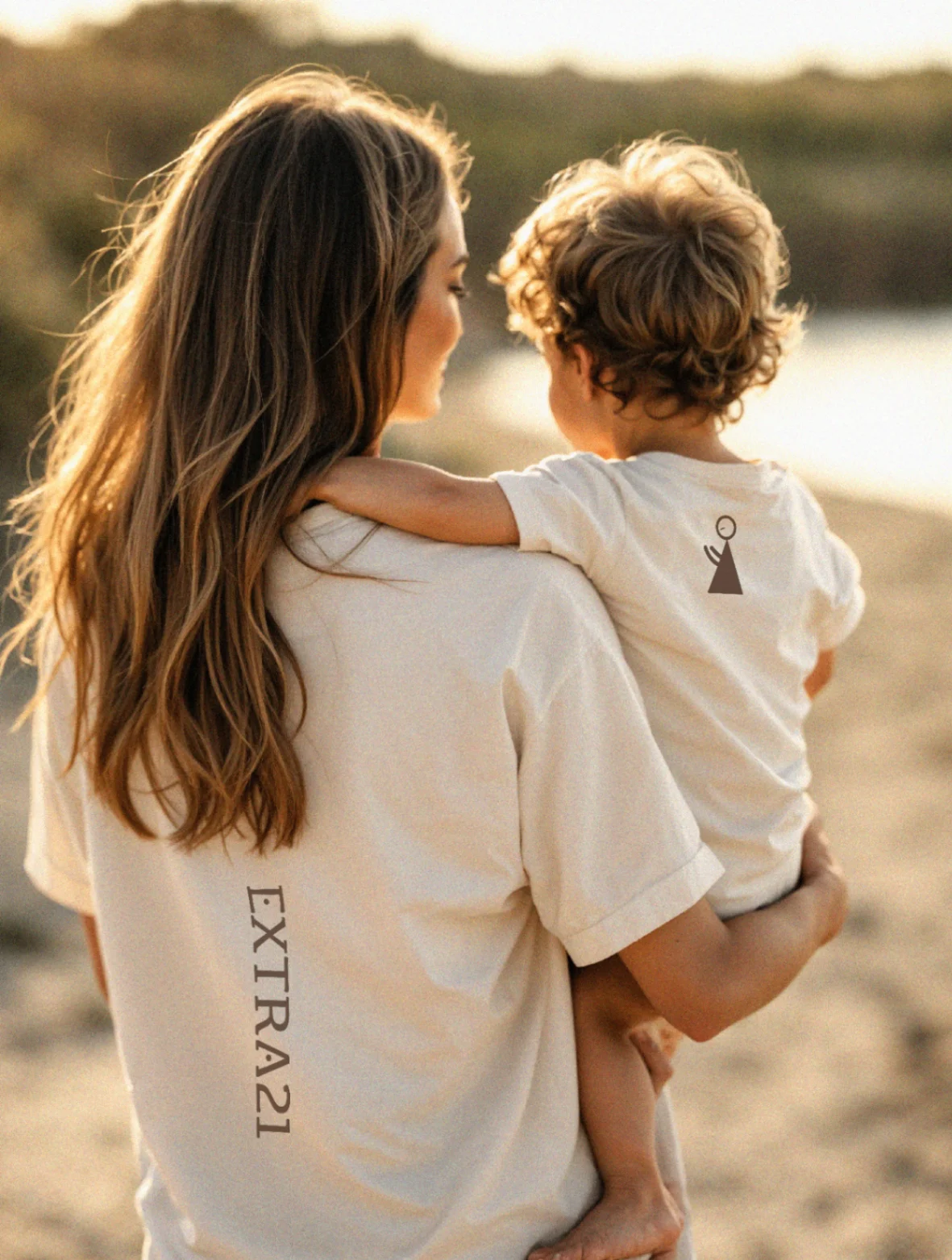 Extra 21 t-shirts worn by a mother and child