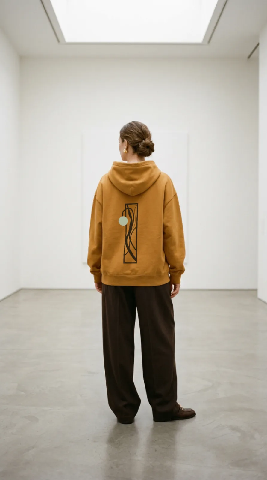 Chapter mustard hoodie with vertical logo artwork